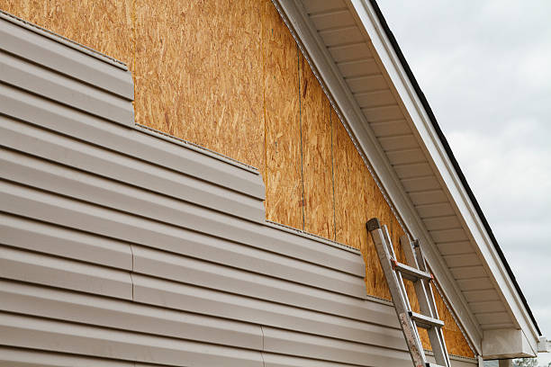 Professional Siding Repair technician working in Blanchester, OH